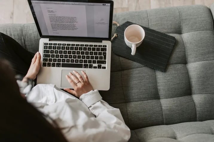A woman working from home on her laptop