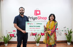 Image of Chhaya and Priyoshop's founder joining forces and launching Health card.