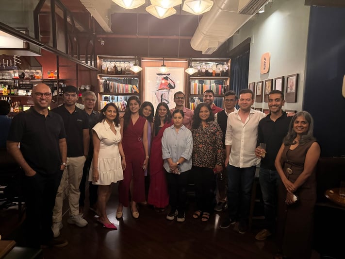 A group picture of BonBillo's Mumbai Mixer from Dec 2025 where founders, investors, mentors, and partners celebrated alumni startups including Pinky Promise, BabbleBots AI, Freight Tiger, ProMeat, and SustLabs
