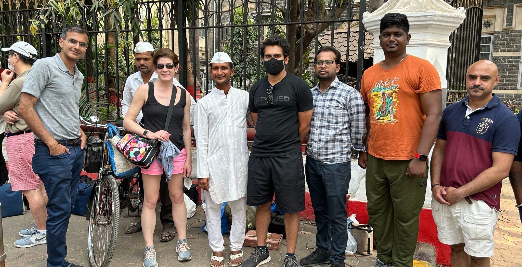 Cohort with Mumbais dabbawalas who have a Six Sigma performance rating for delivering lunchboxes to over 200,000 customers with clockwork regularity and precision-1